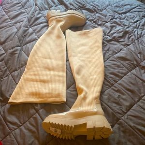 Thigh high lug sole boots